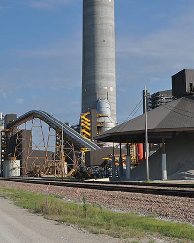 Belt delivery conveyor for bulk material handling